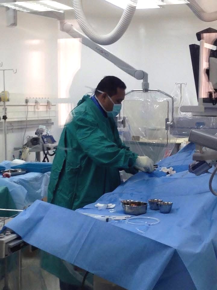 Dr Zool Hilmi performing an MAA mapping procedure in the angiography suite before SIRT in 2015
